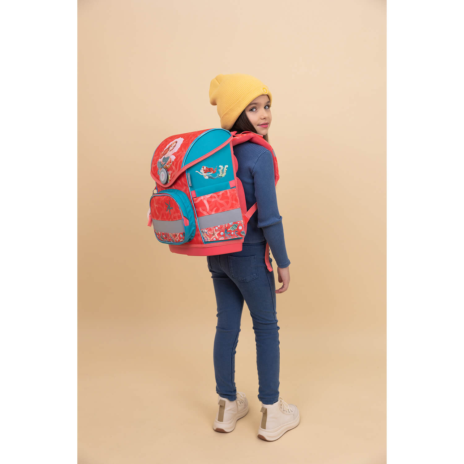 Close-up view of the Belmil Compact Ergonomic School Bag Set “Sea Queen” Design + Unicorn Raincoat – 5-Piece Set for Girls showing the lightweight materials.