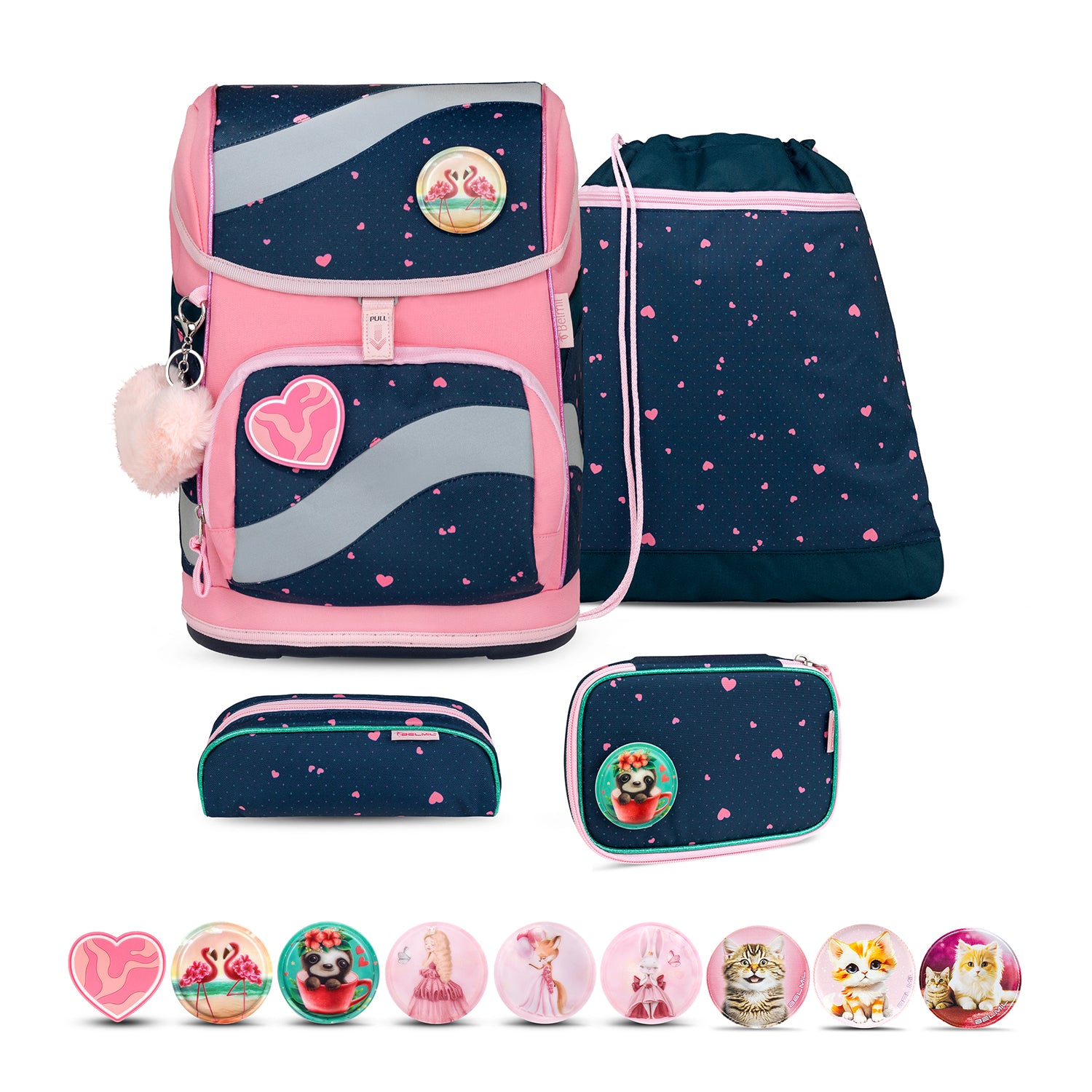 The Belmil Smarty In Love With Hearts Ergonomic School Bag Set – 5-Piece Set with 9 Interchangeable Patches and Hip Belt displayed against a playground backdrop, showcasing its colorful design.