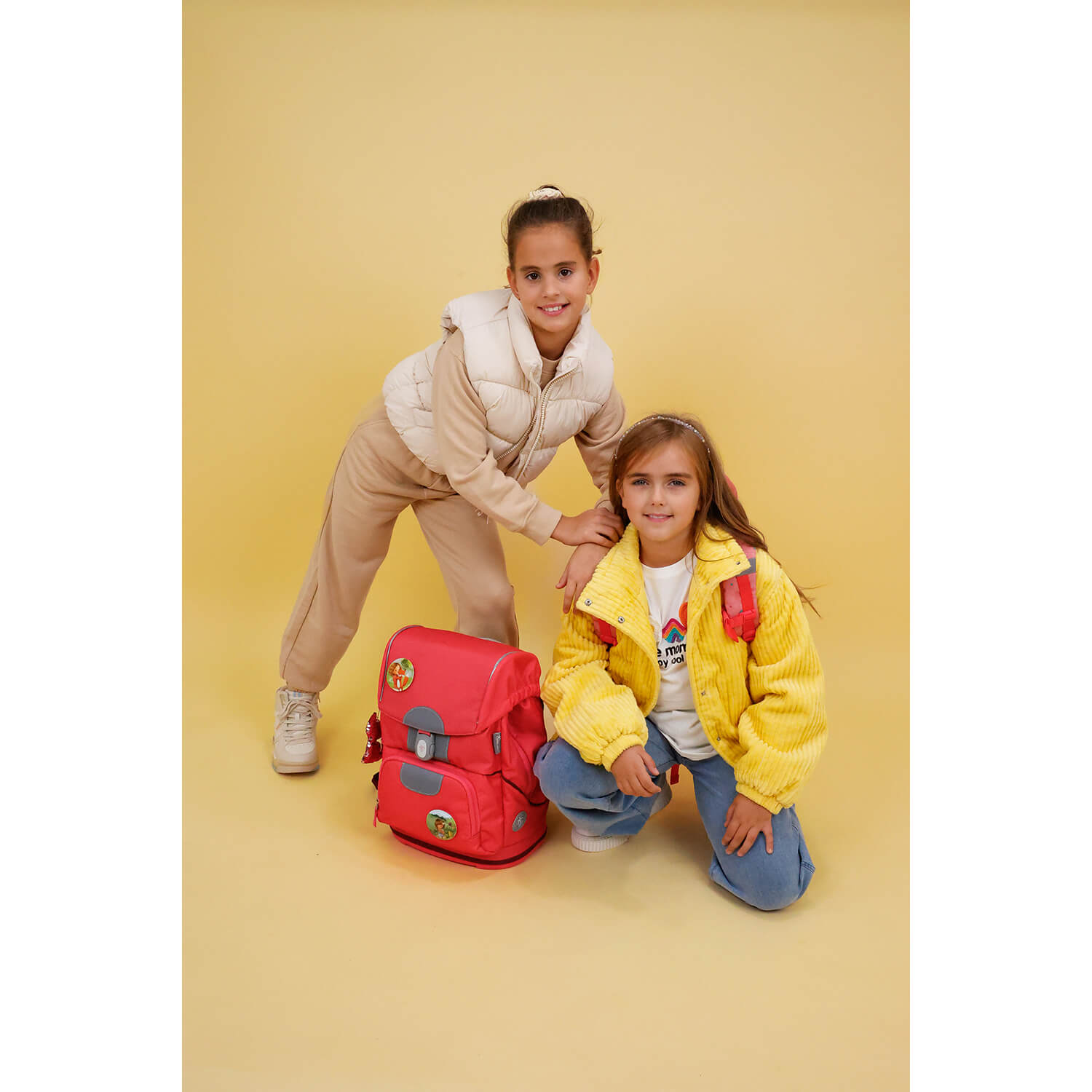 Close-up of the 9 interchangeable patches of the Belmil Motion Sweet Candy Ergonomic School Bag Set – Made from Recycled Materials, 5 pcs, with 9 Interchangeable Patches, featuring cute animal designs.