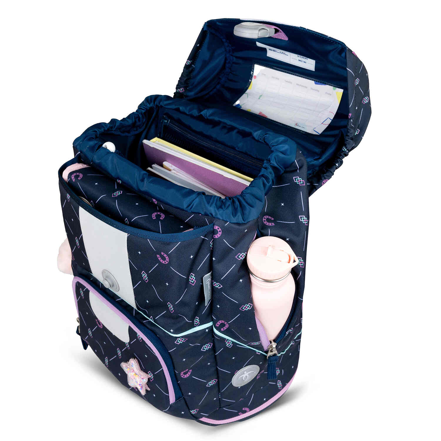 The Belmil Motion Midnight Gallop Ergonomic School Bag Set – Made from Recycled Materials, 5 pcs, with 9 Interchangeable Patches on display in a cozy classroom setting.