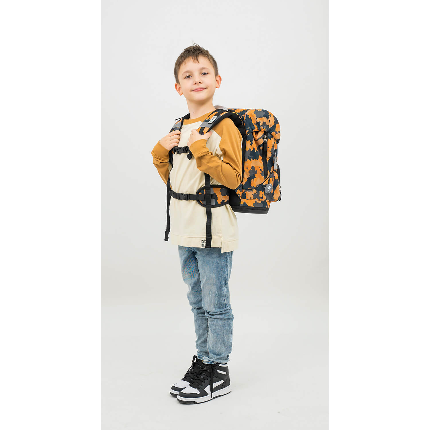 Close-up of ergonomic shoulder straps on Belmil Motion Orange Camouflage School Bag, highlighting comfort features.