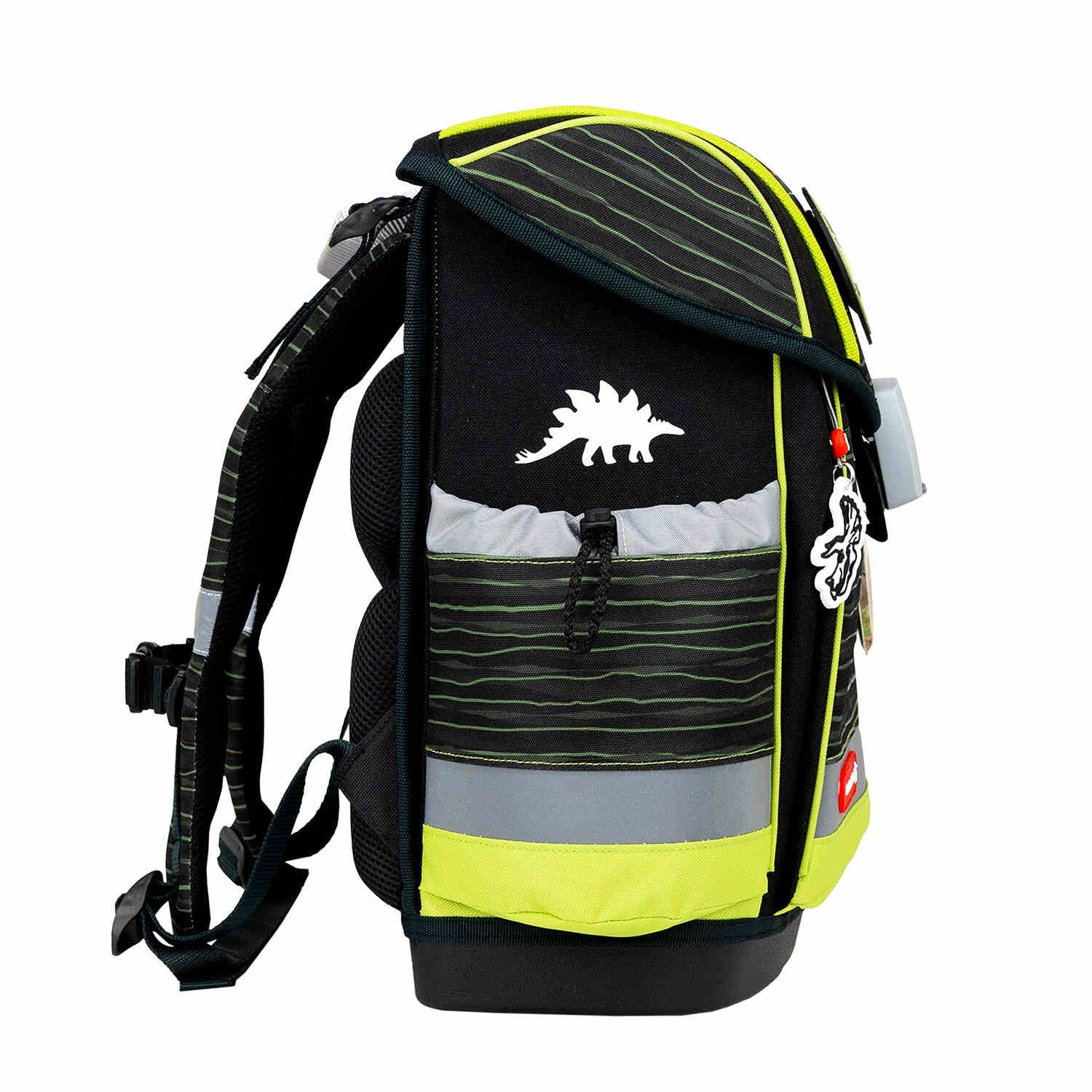 The Belmil Classy Plus Prehistoric Times School Bag Set for Boys + Lost World Patch Set (5 pcs) in an outdoor setting, featuring the removable chest strap.