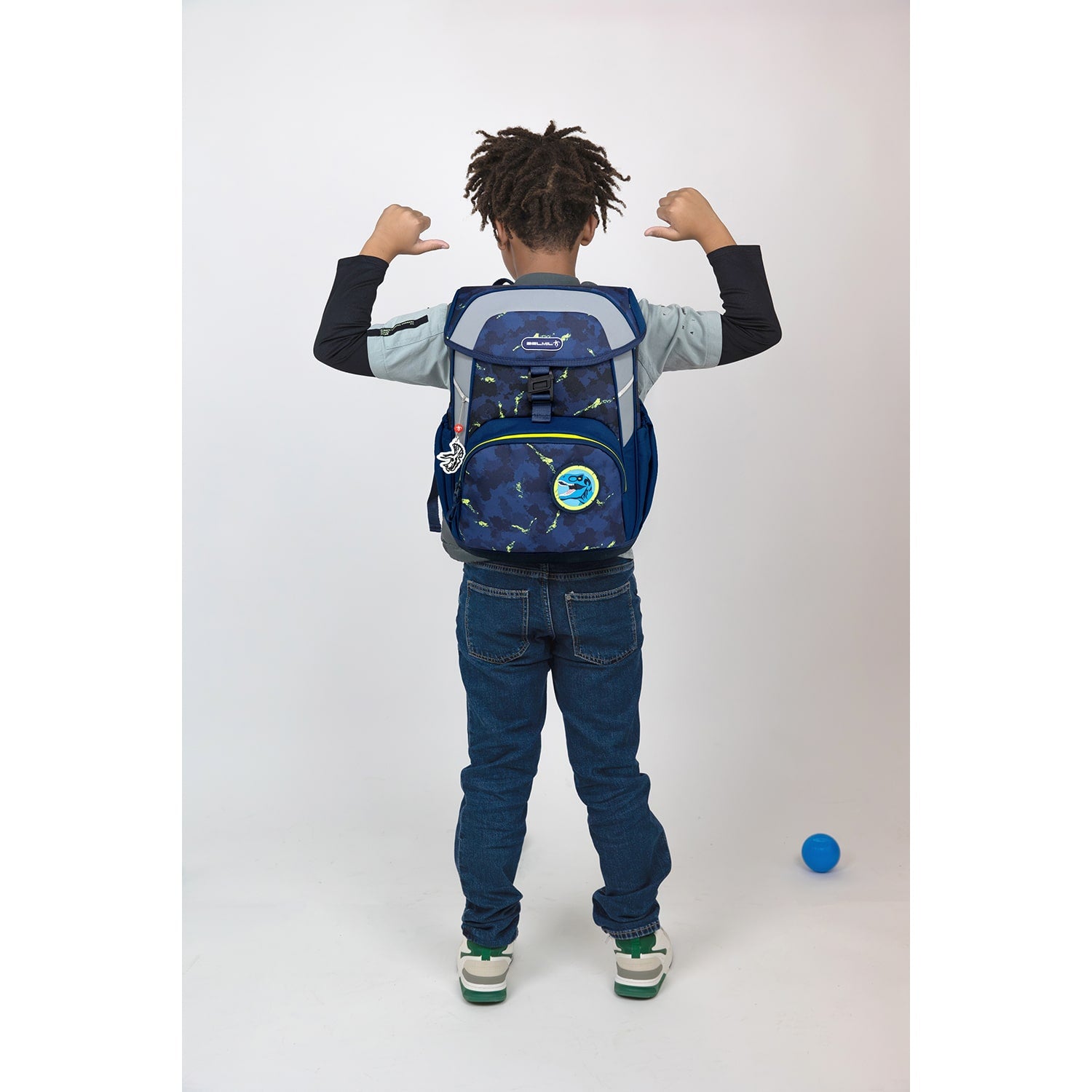 Belmil Maxi Pack T-Rexy Ergonomic School Bag Set for Boys – 5-Piece Set + Interchangeable Dinosaur Patch Set showcasing the padded shoulder straps and breathable back panel for comfort.
