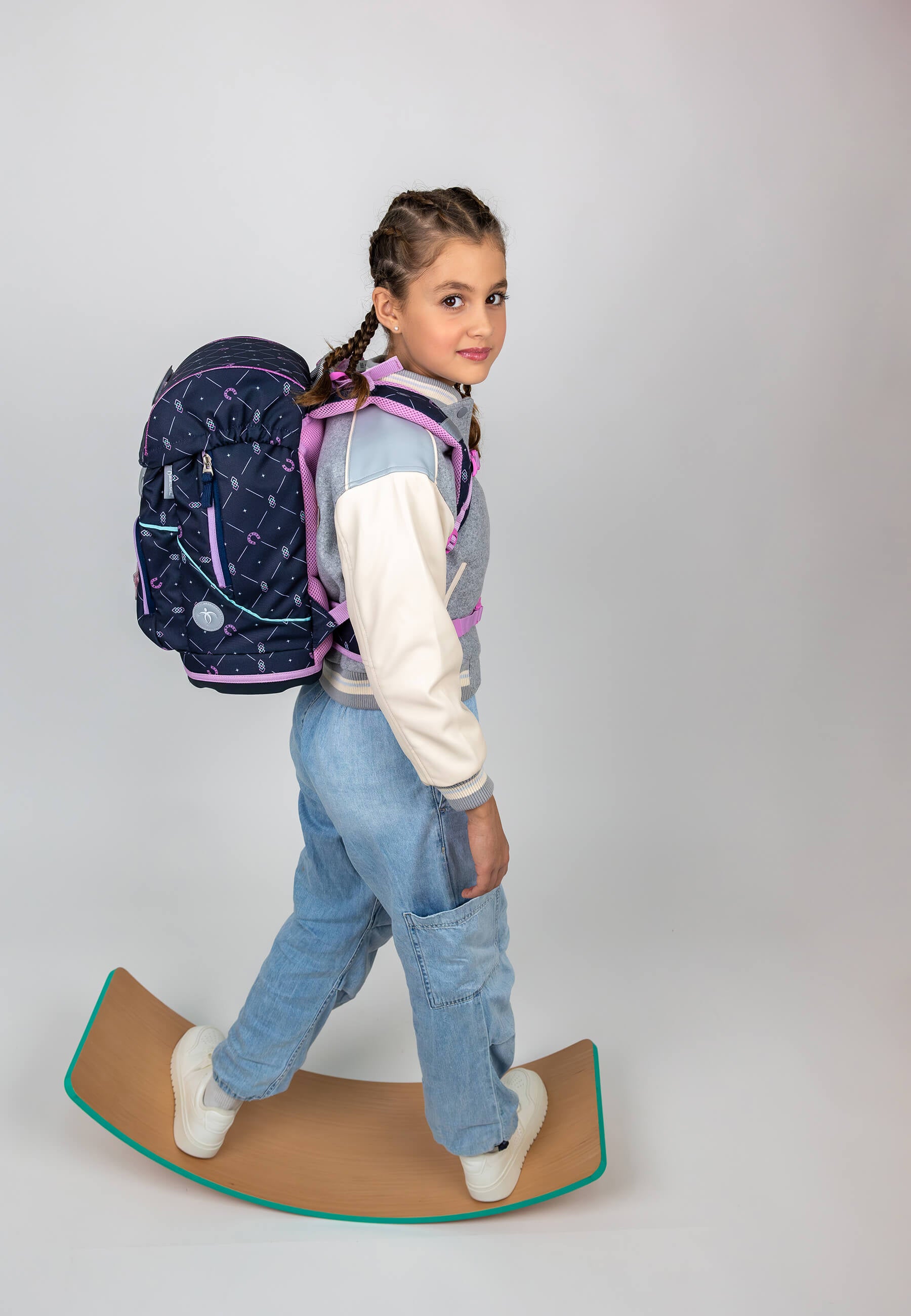 Close-up of the Belmil Motion Midnight Gallop Ergonomic School Bag Set – Made from Recycled Materials, 5 pcs, with 9 Interchangeable Patches showing the lightweight construction and insulated front pocket.