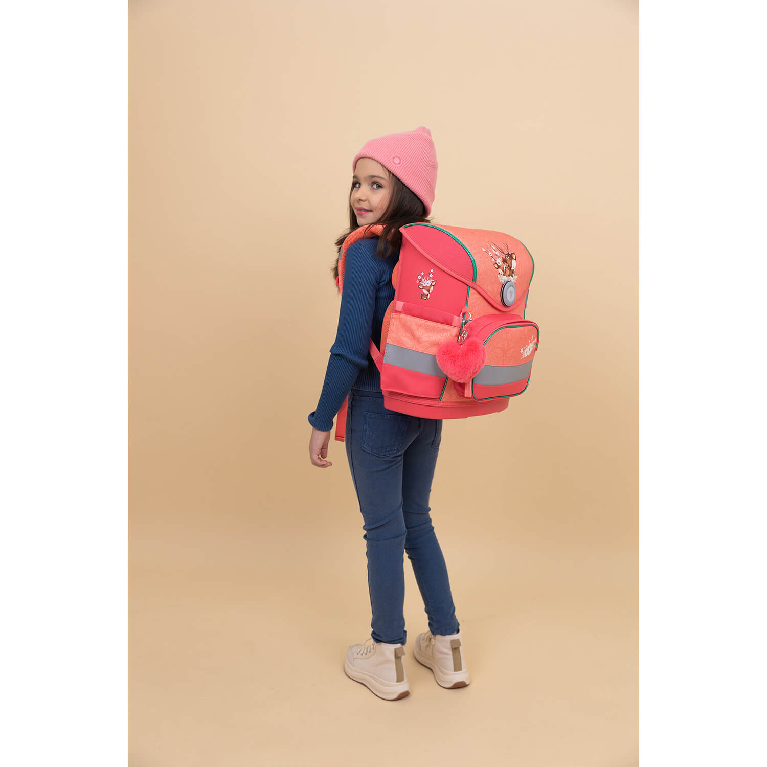 The full Belmil Compact Ergonomic School Bag Set 'Cute Doe' including the unicorn raincoat, emphasizing its functional design for girls.